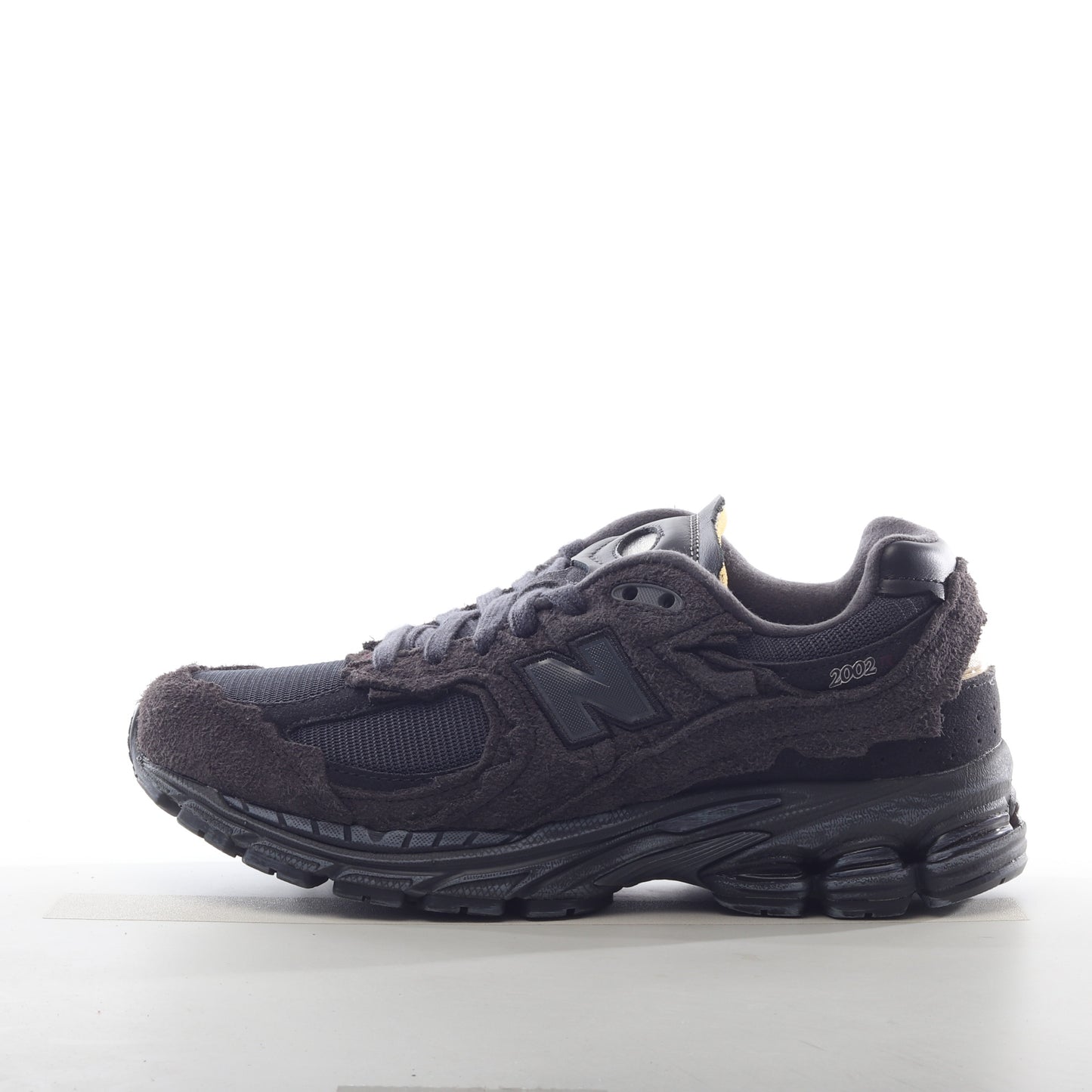 New Balance 2002 Black Buckle