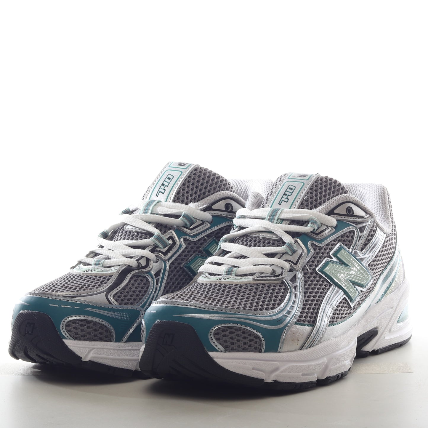 New Balance 740 Teal Navy