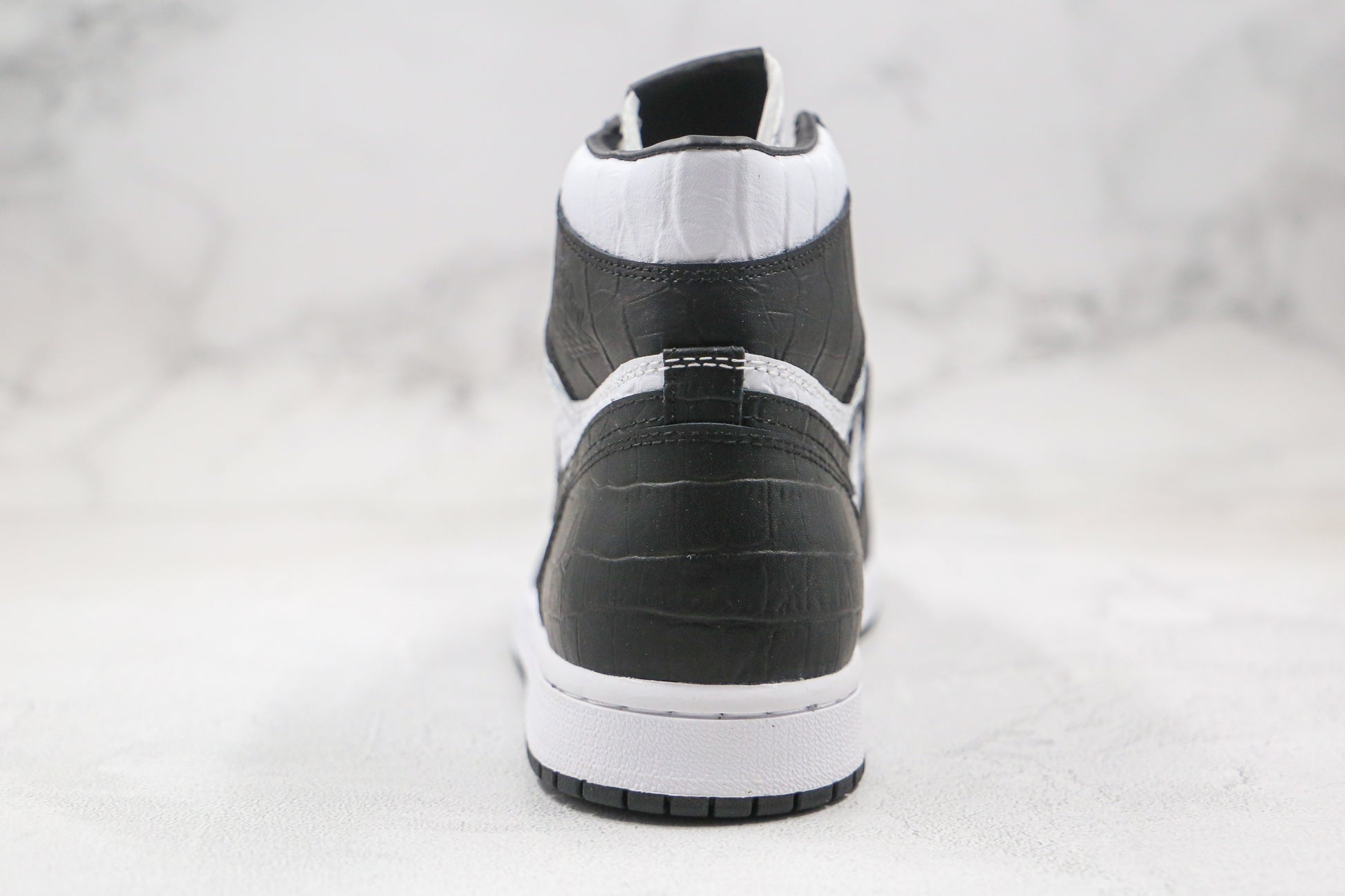 Air Jordan 1 High Snake Swoosh Logo