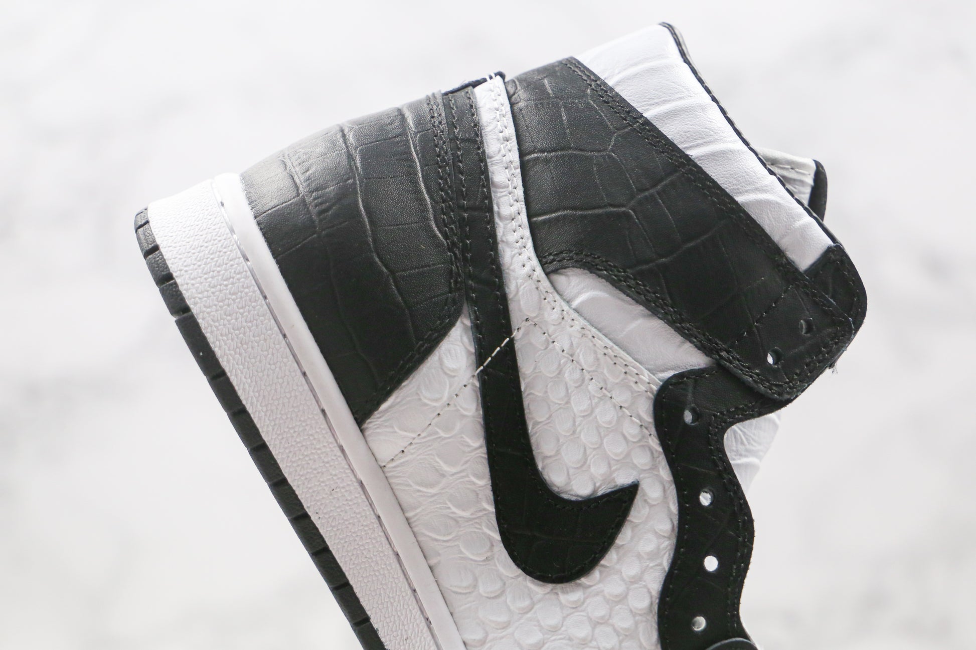 Air Jordan 1 High Snake Swoosh Logo