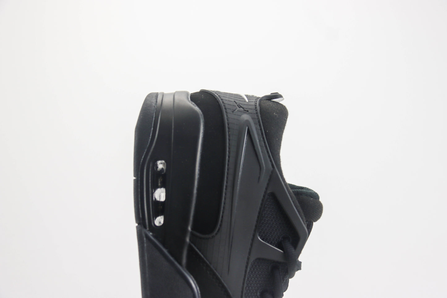 Air Jordan 4 RM Triple Black