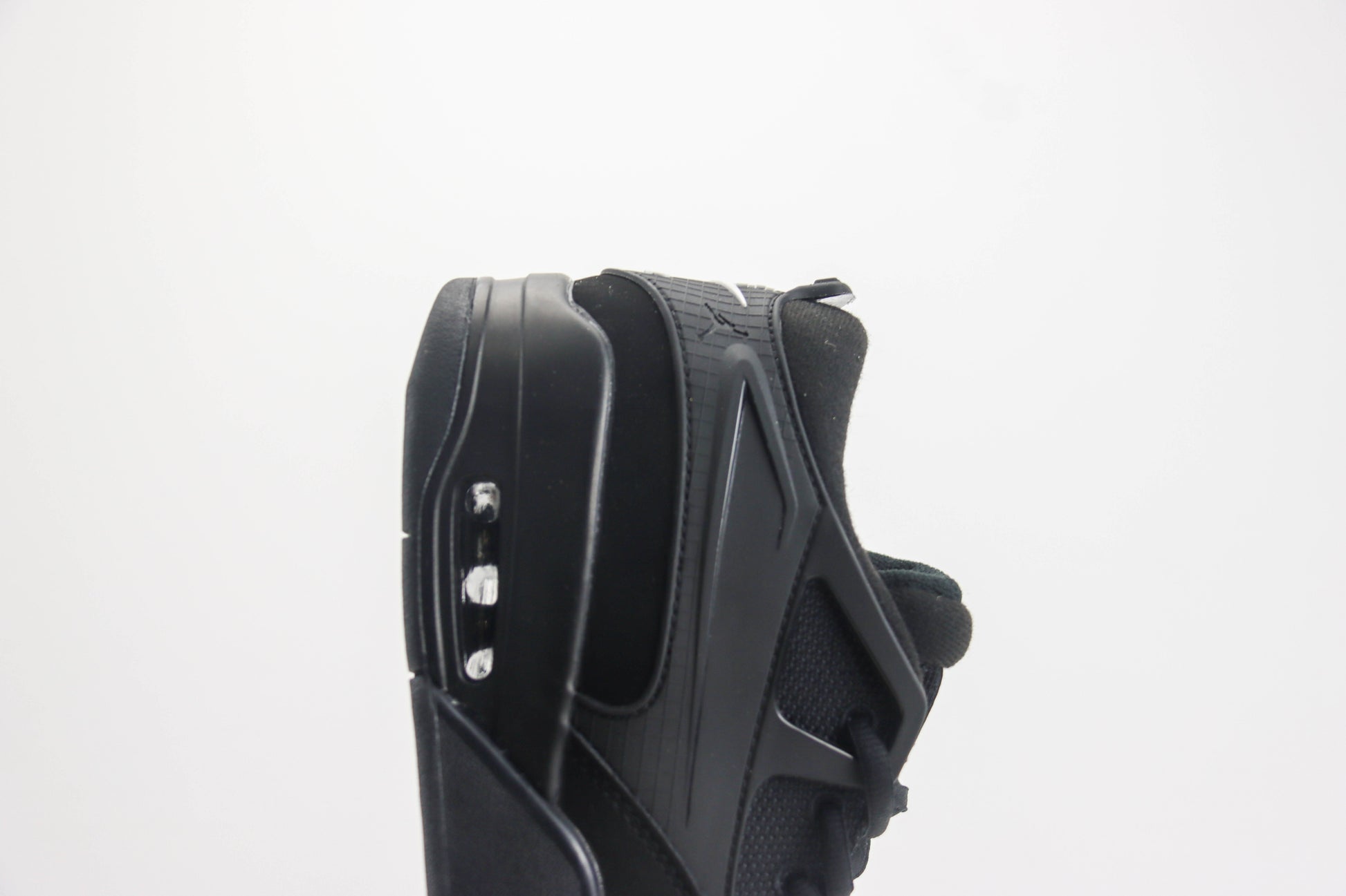 Air Jordan 4 RM Triple Black
