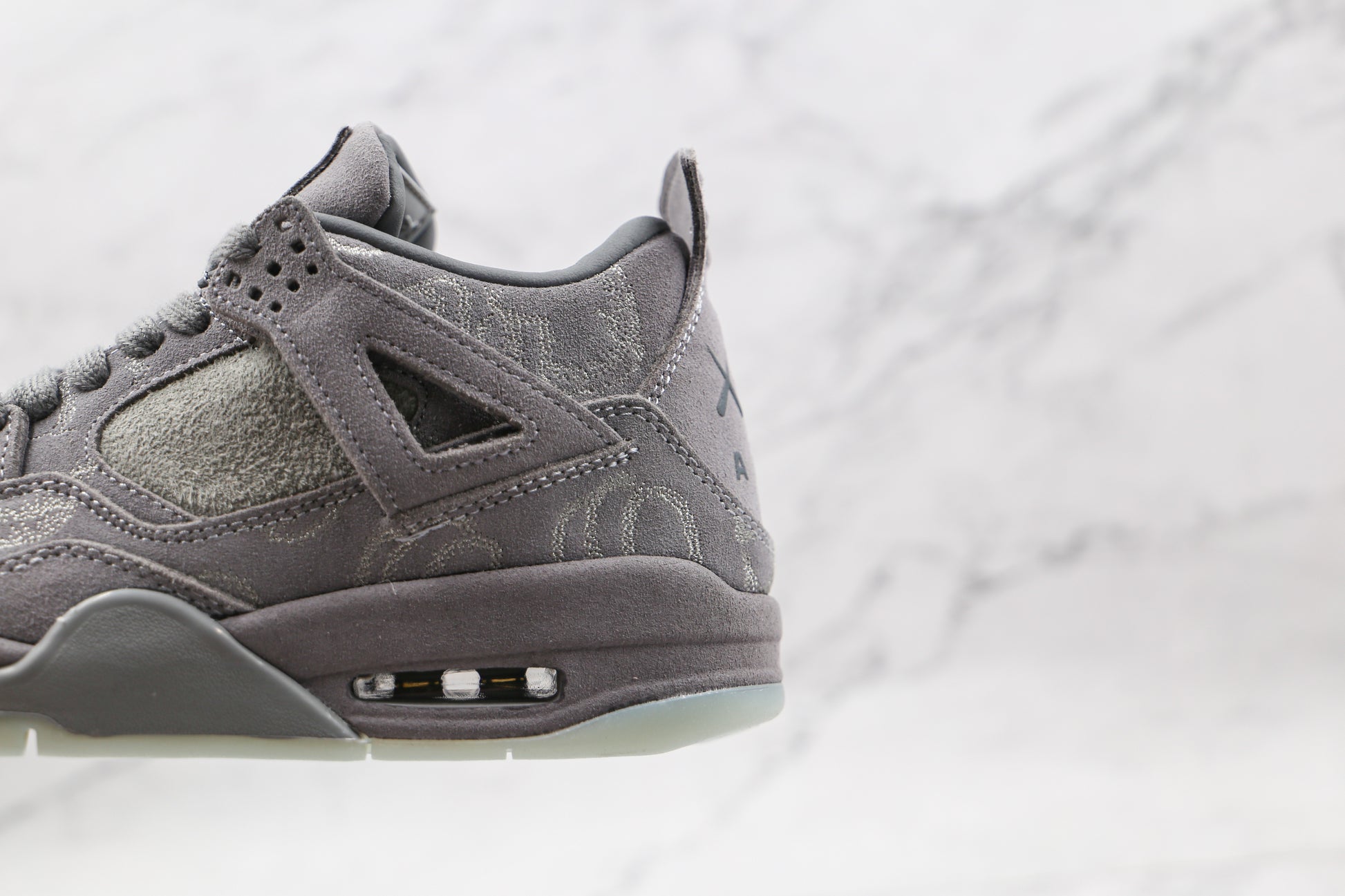 Air Jordan 4 KAWS Cool Grey