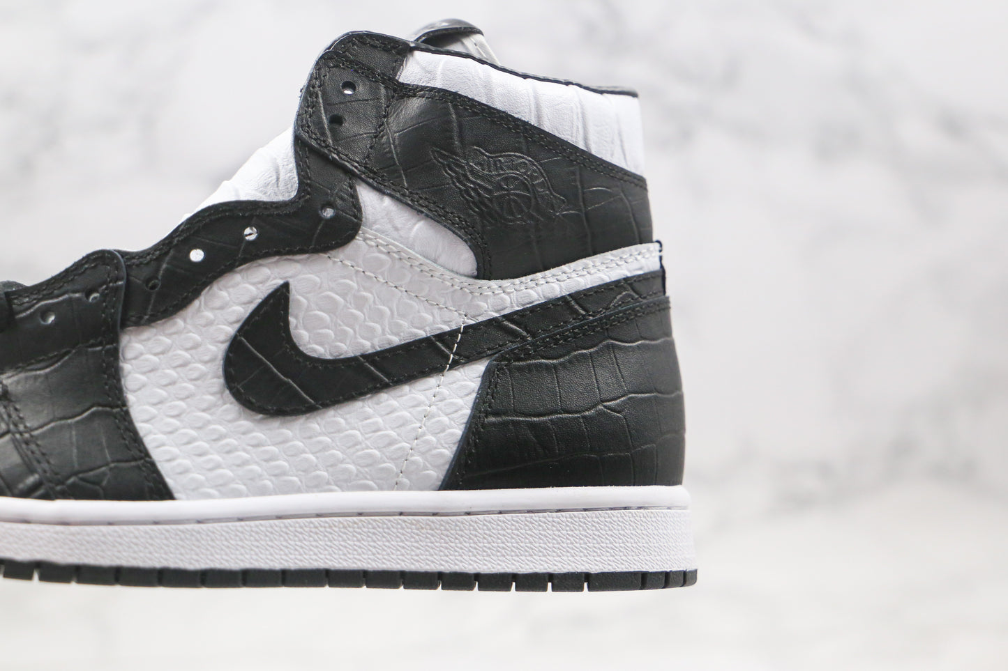 Air Jordan 1 High Snake Swoosh Logo