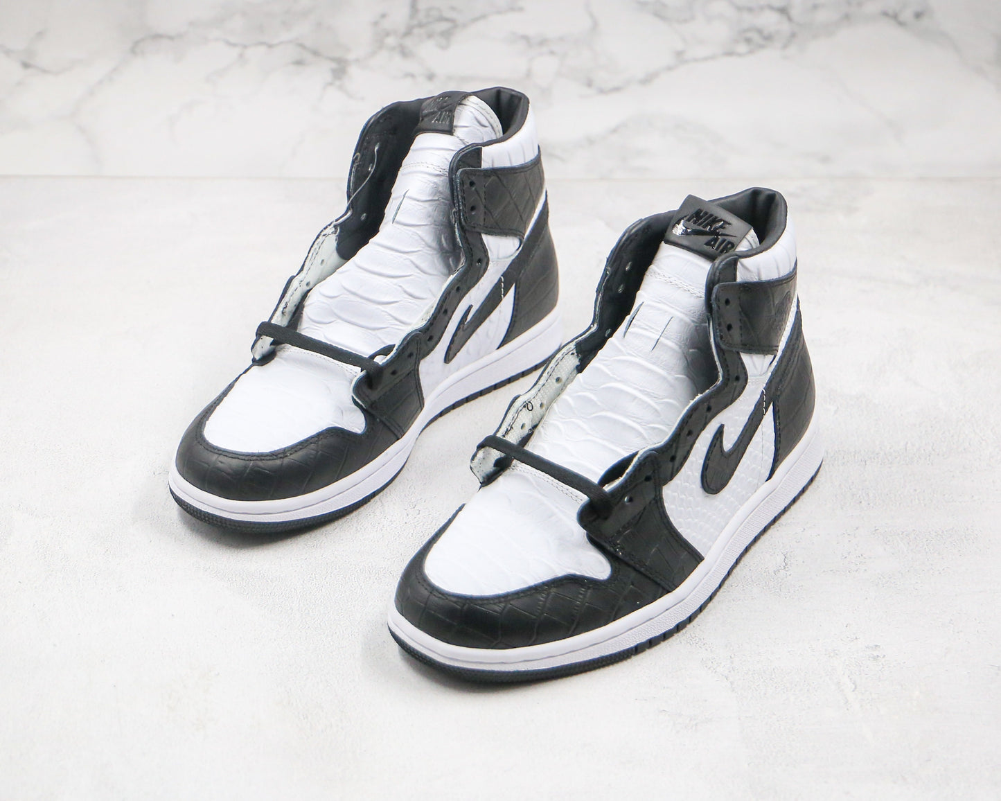 Air Jordan 1 High Snake Swoosh Logo