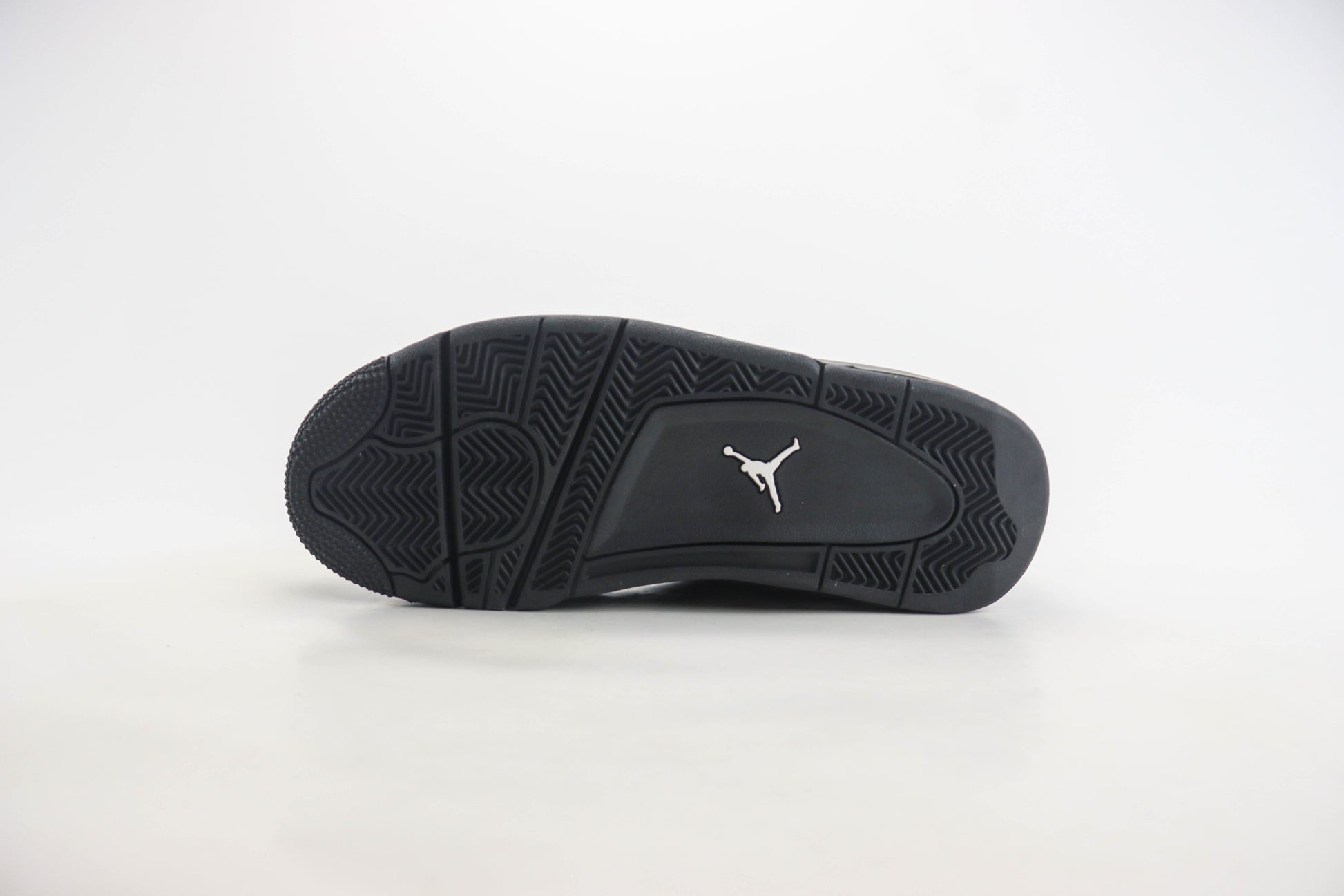 Air Jordan 4 RM Triple Black