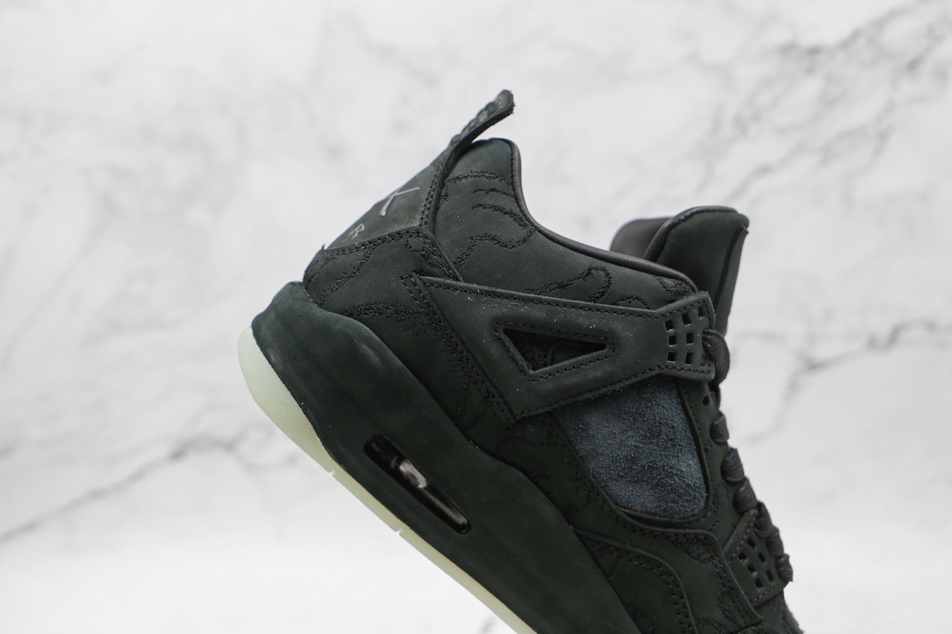 Air Jordan 4 KAWS Black