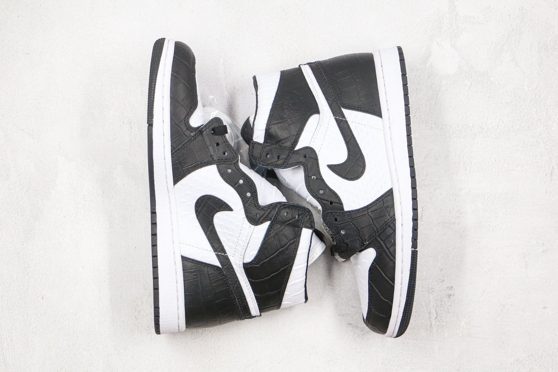 Air Jordan 1 High Snake Swoosh Logo