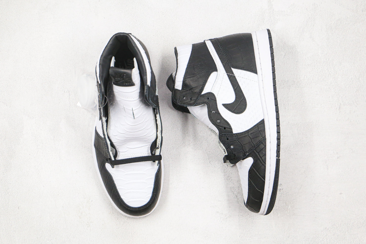 Air Jordan 1 High Snake Swoosh Logo