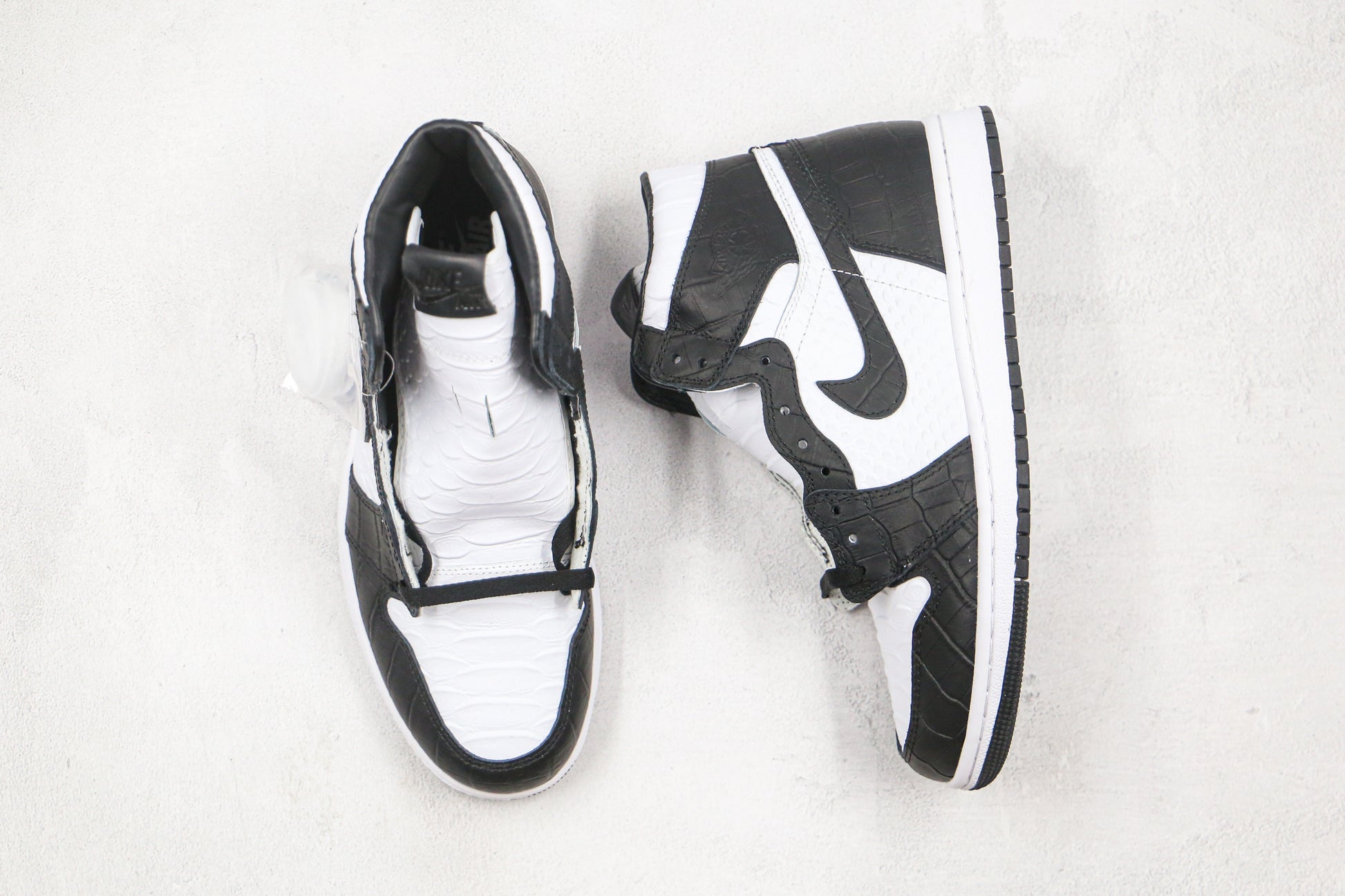 Air Jordan 1 High Snake Swoosh Logo